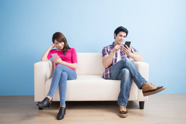 istock young couple play phone happily 650237958