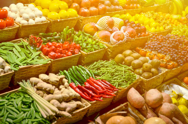 istock Fruit market with various colorful fresh fruits and vegetables 650238624