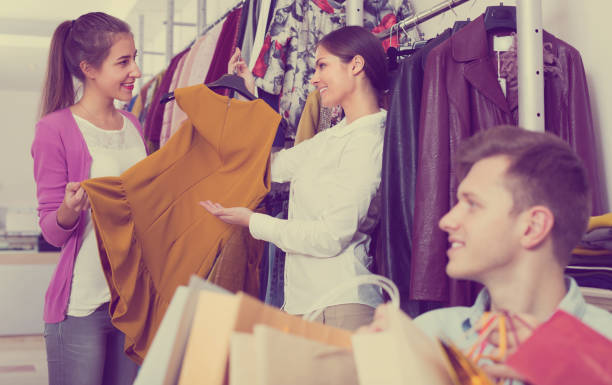 istock Young man waiting for female at shop 650242520
