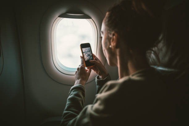 istock Taking photos from an airplane 650243450