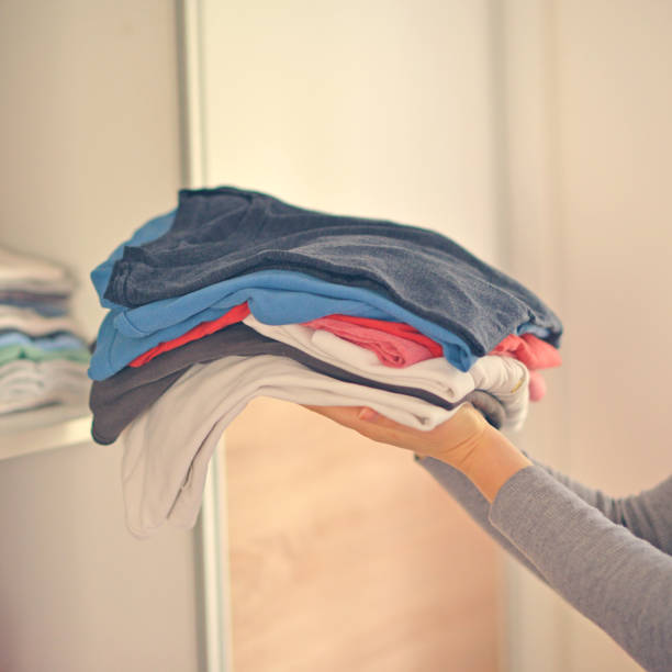 istock Housewife organizing clothes in wardrobe 650244022