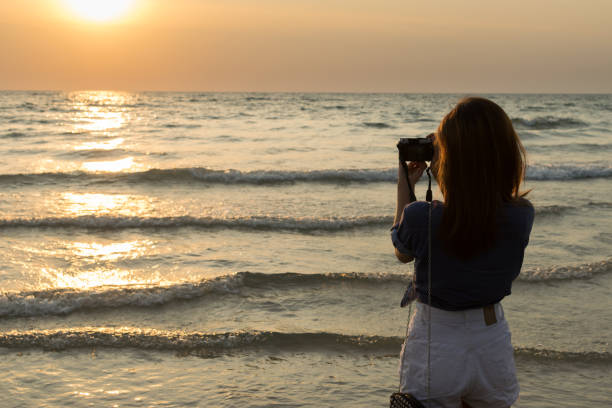 istock Female traveler taking a photo 650246112