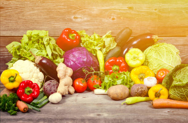 istock Huge group of fresh vegetables on wooden  table - Hight quality studio shot 650246162