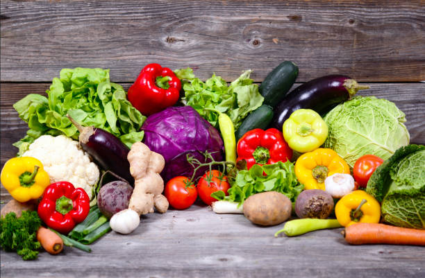 istock Huge group of fresh vegetables on wooden  table - Hight quality studio shot 650246174