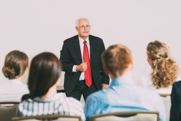 istock Senior Businessman Holding Report 650255256