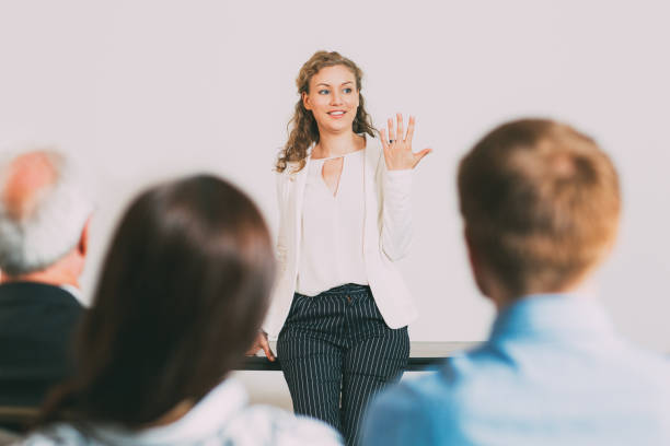 istock Successful Young Businesswoman Holding Report 650257270