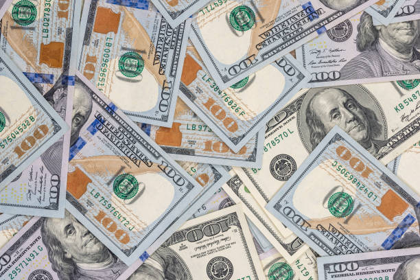 istock Pile of $100 dollar bills for background. 650263478