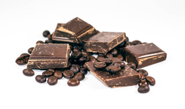 istock pieces of chocolate with coffee beans on a white background 650302048