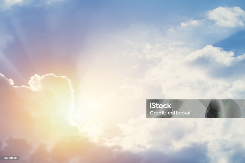 new hope or heaven sky, beautiful summer blue bright cloudy sky with sunset light ray. Heaven Stock Photo