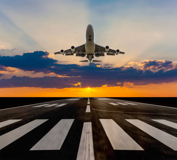 istock Passenger airplane taking off at sunset 650322650