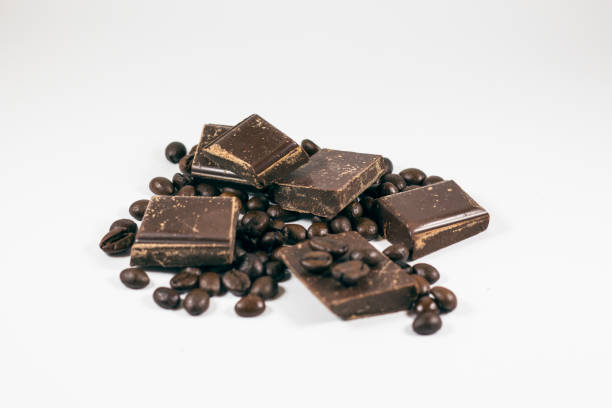 istock pieces of chocolate with coffee beans on a white background 650328390