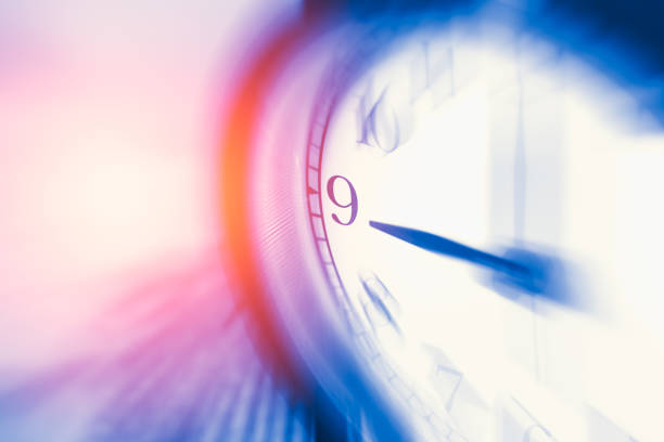 istock clock time with zoom motion blur focus at 9 o'clock, fast speed business hour concept. 650338138