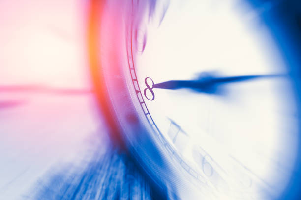 istock clock time with zoom motion blur focus at 8 o'clock, fast speed business hour concept. 650341732