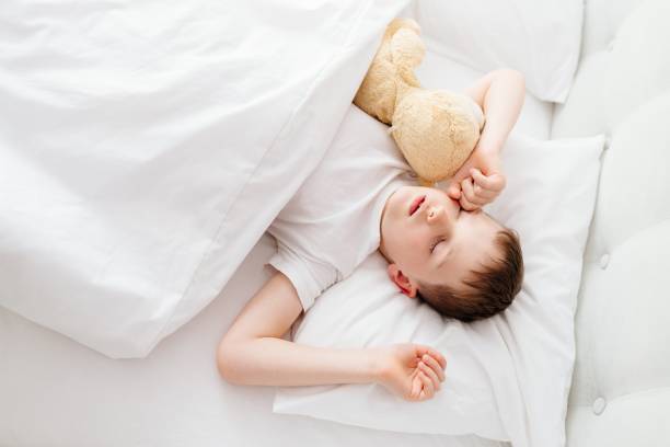 istock Little boy child waking up at the morning 650342546