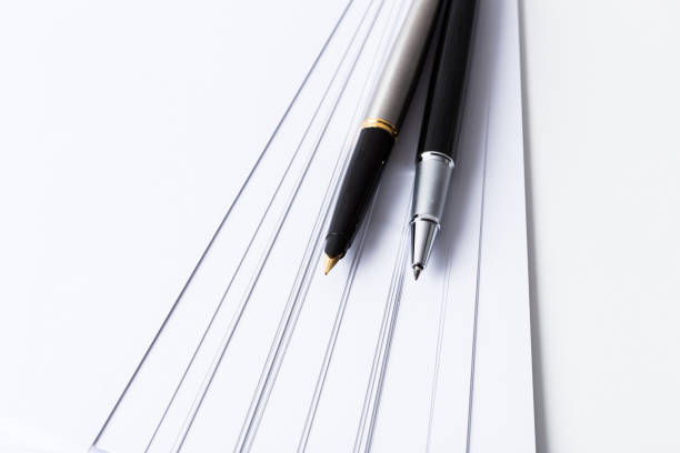 Close-up of  pen and paper