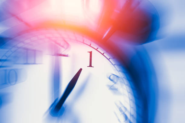 istock clock time with zoom motion blur focus at 1 o'clock, fast speed business hour concept. 650351384