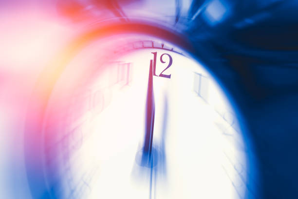 istock clock time with zoom motion blur focus at 12 o'clock, fast speed business hour concept. 650367234