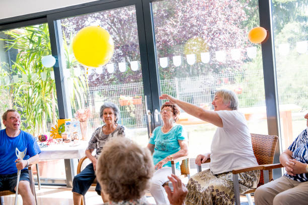 istock Seniors Doing Relaxation Exercises In The Elderly Day Care Center 650383084