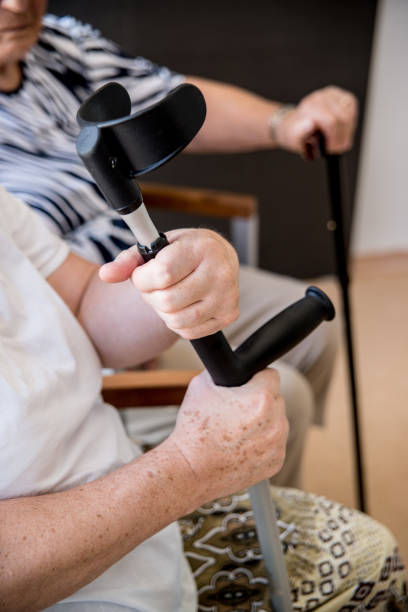 istock Seniors  In The Elderly Day Care Center Need Help For Walking 650384380