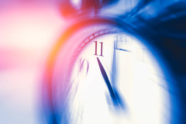 istock clock time with zoom motion blur focus at 11 o'clock, fast speed business hour concept. 650402926