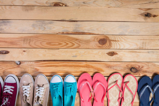 istock shoes on brown wooden floor 650402956