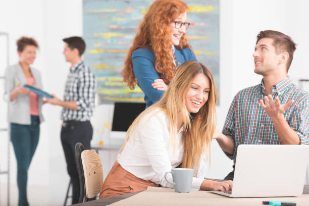 istock Young woman by the laptop 650406686