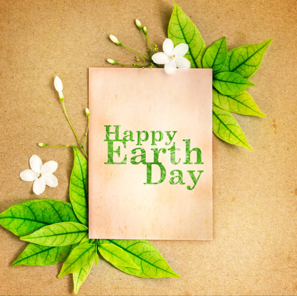 istock Happy Earth Day paper sheet with fresh spring  green leafs 650406742