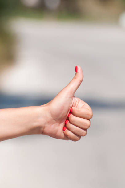 istock Woman hand hitchhiking 650429558