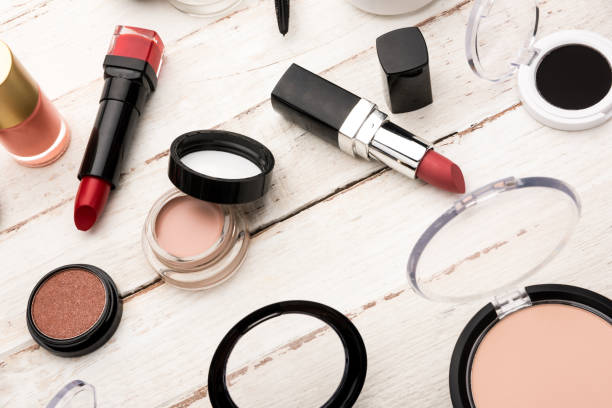 istock close up view of various brushes and cosmetics for applying makeup on table 650450118