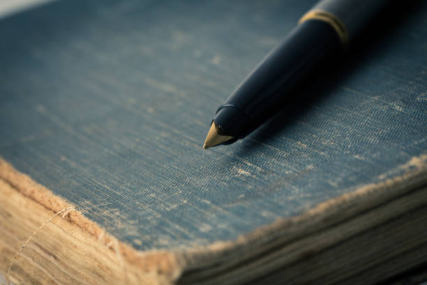 istock Vintage books and pen 650468216