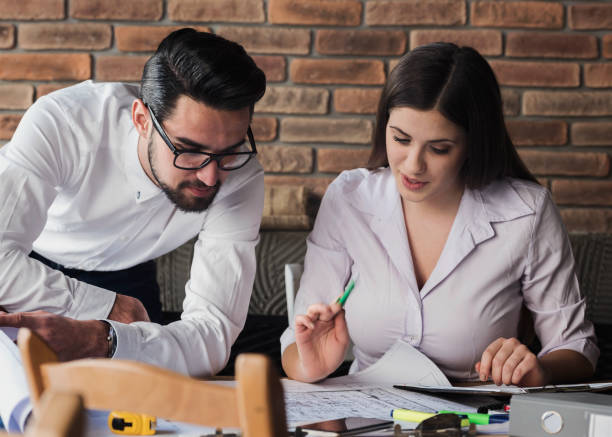 istock Young startup business couple working 650484048
