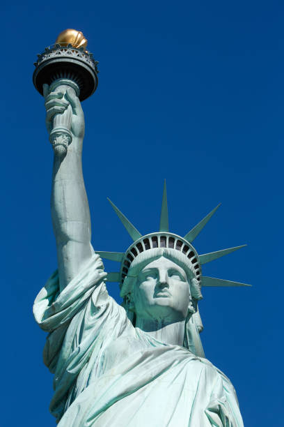 istock Statue of Liberty, blue sky in a sunny day 650490022