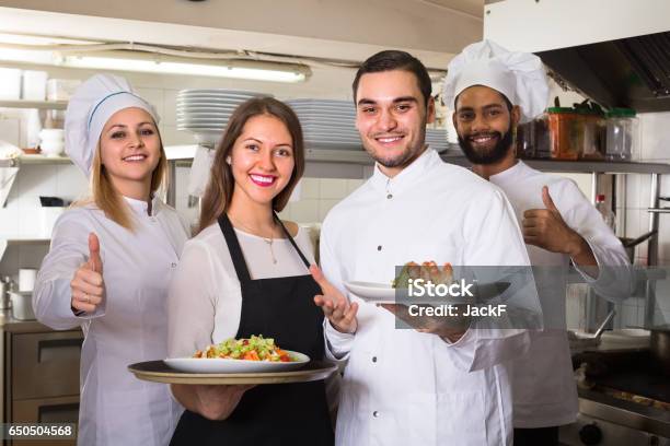 Portrait Of Positive Kitchen Workers Stock Photo - Download Image Now - Adult, Apron, Cafe