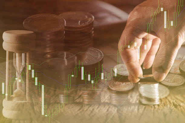 istock Hand putting money coins stack in finance and banking concept. 650509654