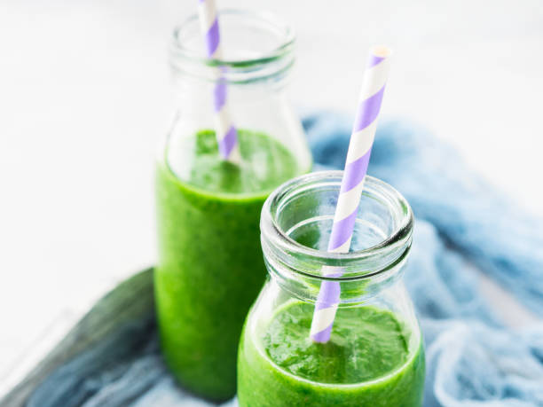 istock Healthy food concept green spinach smoothie breakfast 650559514