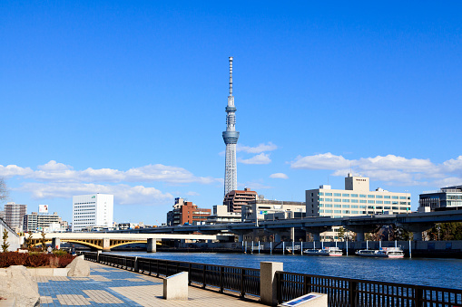 Taito,Tokyo,Japan - February 13, 2017:Tokyo Sky Tree is the highest free-standing structure in Japan. The Sumida River is a river that flows through Tokyo, Japan.