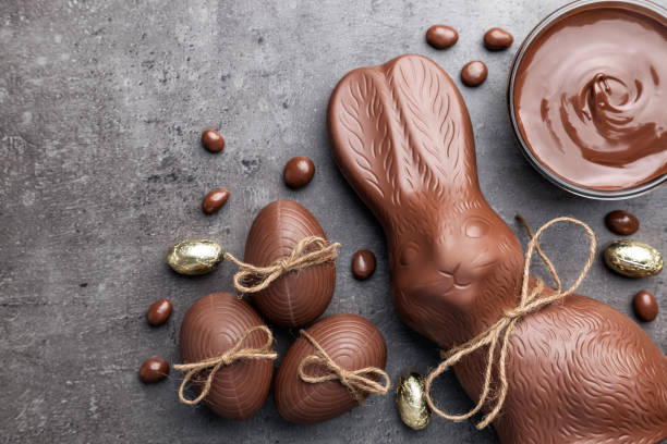istock Chocolate Easter bunny and eggs on wooden background 650563196