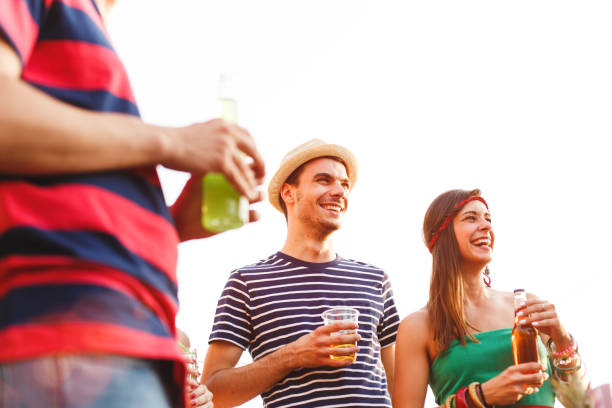 istock Friends drinking at party 650563648