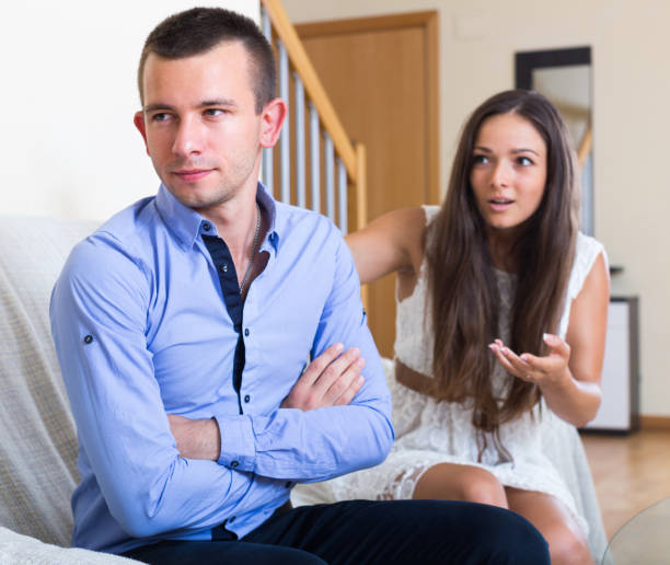 istock Couple sulking on each other 650564798