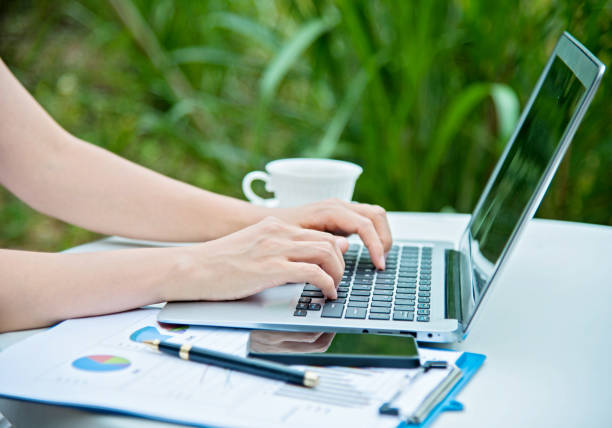 istock Woman hands working on laptop 650565420