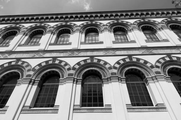 Milan, Italy - August 4, 2016: Milan (Lombardy, Italy): the palace hosting the Museum of Natural History, into the Indro Montanelli Gardens, black and white