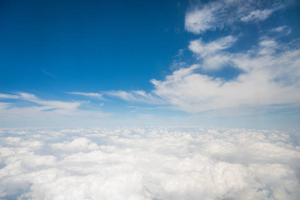istock Above the clouds view from an airplane 650589718