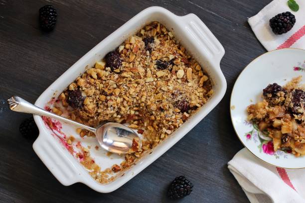 istock Homemade Apple Blackberry crumle on white baking dis 650590232