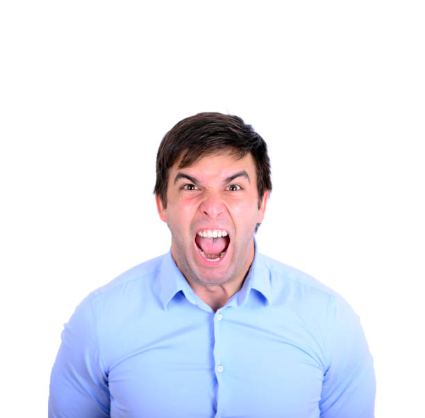istock Portrait of angry young man looking straight forward and shouting 650599112