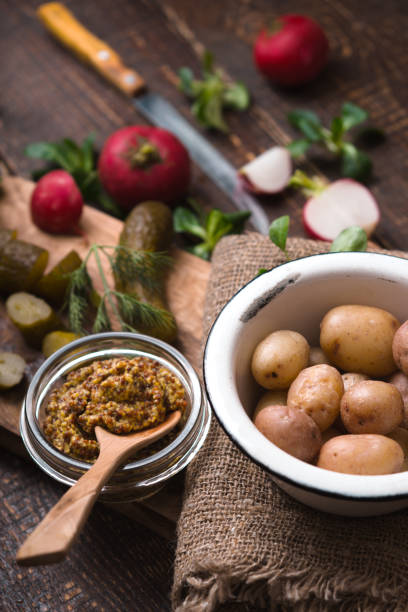 istock Ingredients for rustic vegetable salad on the wooden table  vertical 650602016