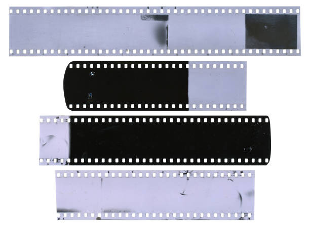 istock Old, used, dusty and scratched celluloid film strips 650612832
