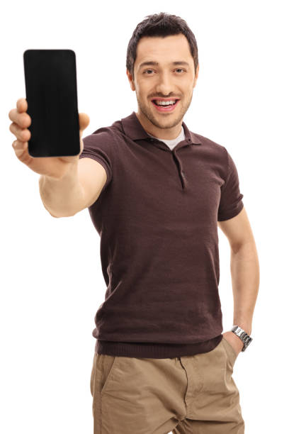 istock Young man showing a phone 650617658