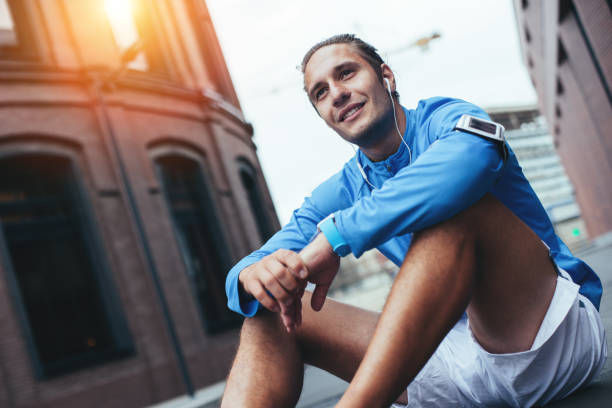 istock Athlete sitting on the street 650620052