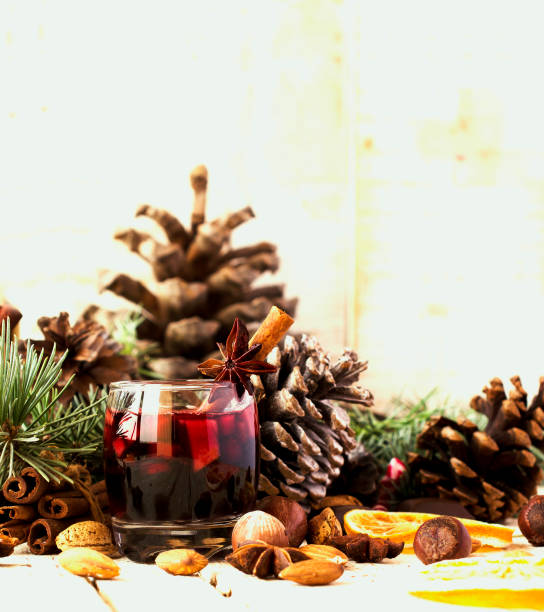 istock New Year or Christmas composition with walnuts, mulled wine, hazelnuts 650625022