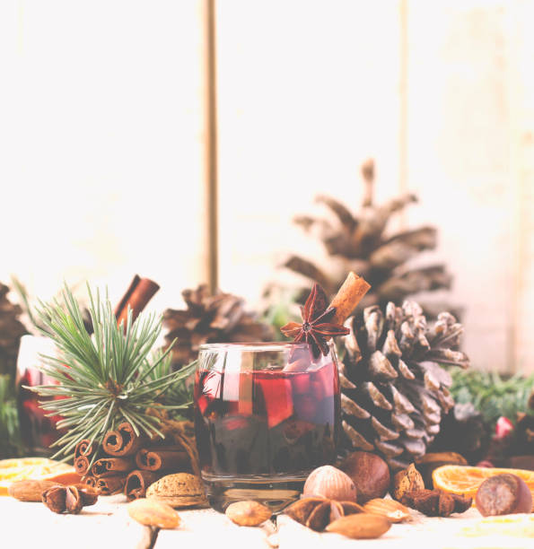 istock New Year or Christmas composition with walnuts, mulled wine, hazelnuts 650625028